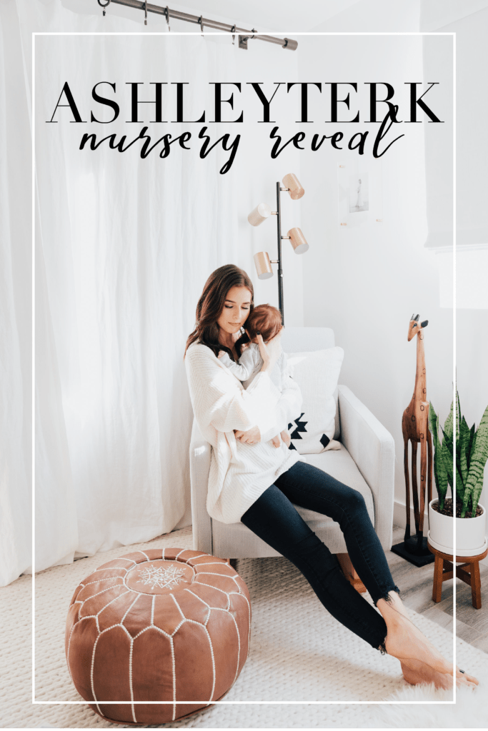 Baby Boy Nursery ideas featured by top Los Angeles life and style blogger, Ashley Hodges: mom sat on a white armchair holding her baby boy in his nursery